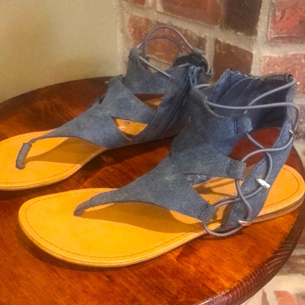 Dollhouse size 6.5 women’s denim blue gladiator type sanders.